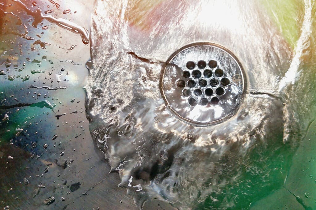 cleaning a dirty drain
