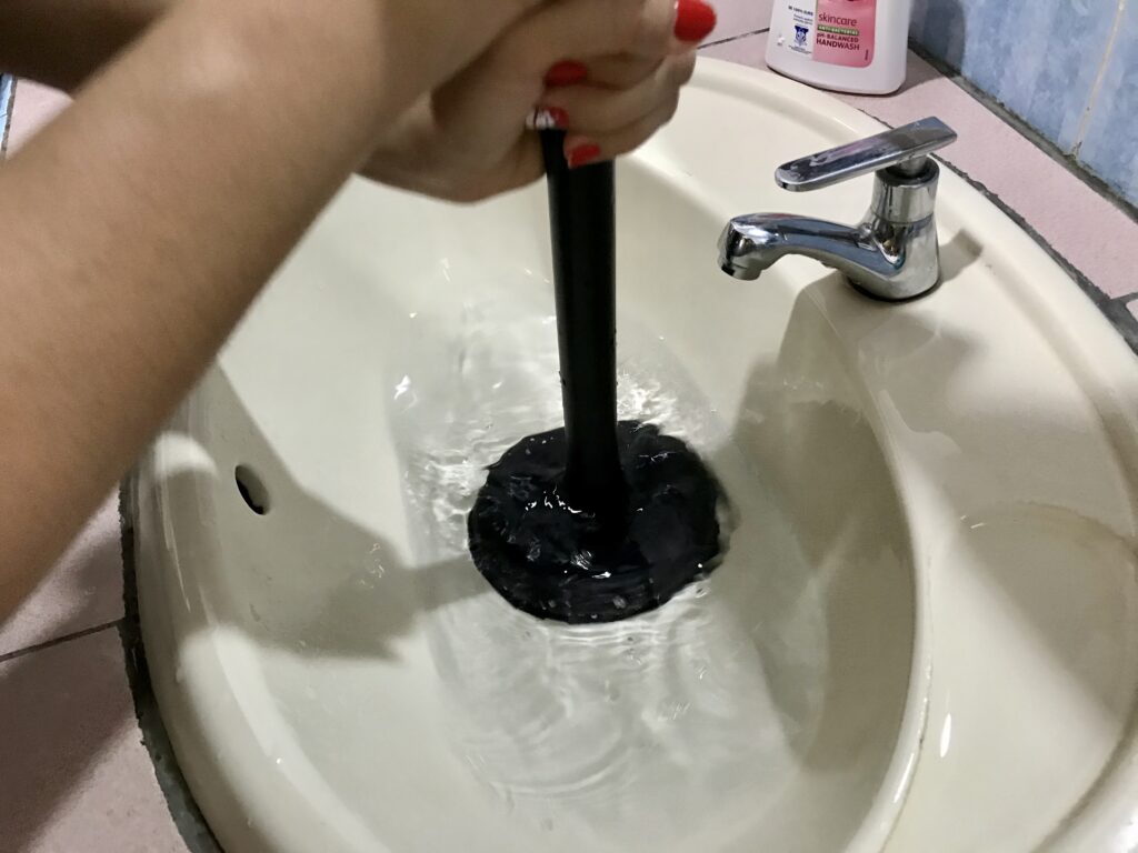 cleaning a dirty drain